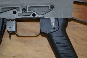 The selector can also be moved to the fire position without removing both hands from the rifle.