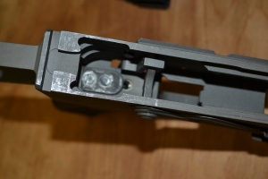 The only permanent modification would be the slot in the receiver.  A new ambi selector and grip must be purchased.